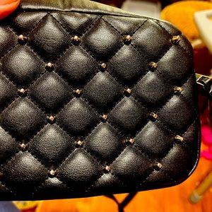 Rebecca Minkoff quilted, studded black crossbody bag.